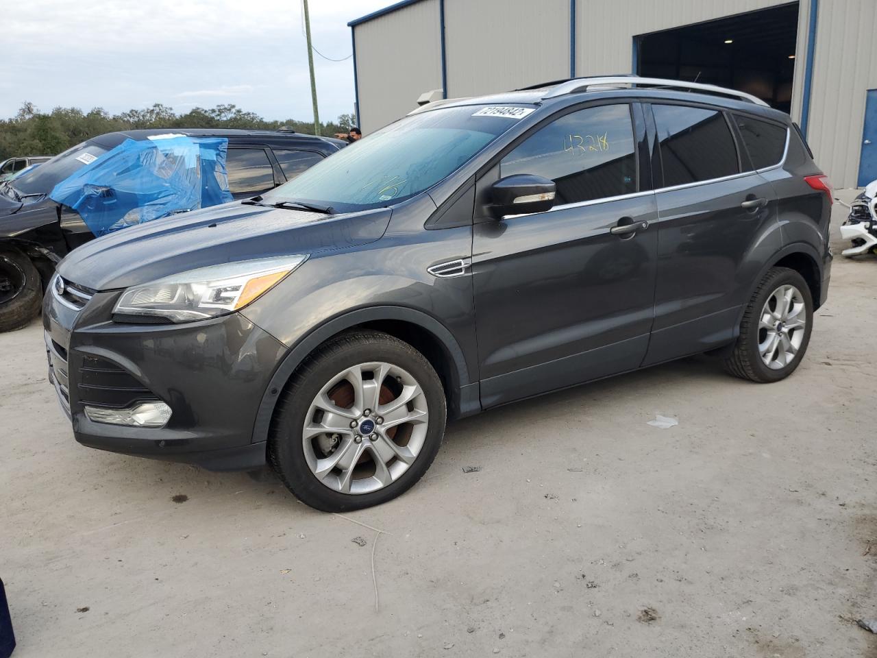 Ford Escape tit (2015)