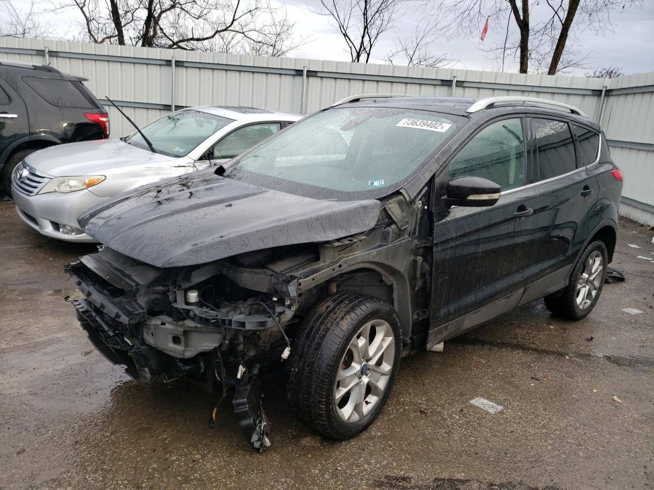 Ford Escape tit (2015)